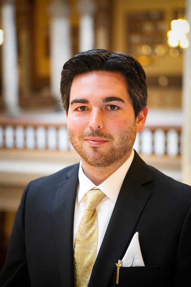 Headshot of Jordan Lett inside the Indiana Statehouse